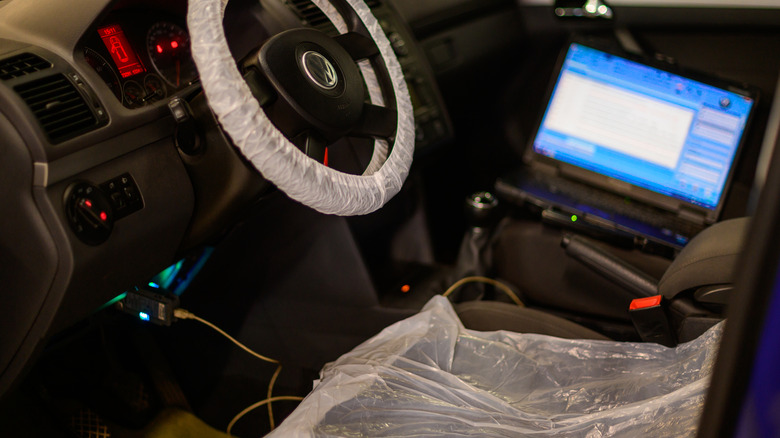 Computer diagnostics inspection being performed on a Volkswagen.