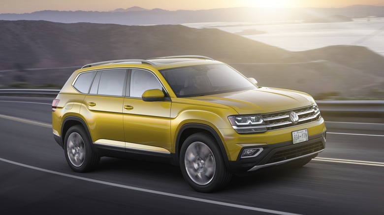 Volkswagen Atlas driving on a road with the Golden Gate Bridge in the background