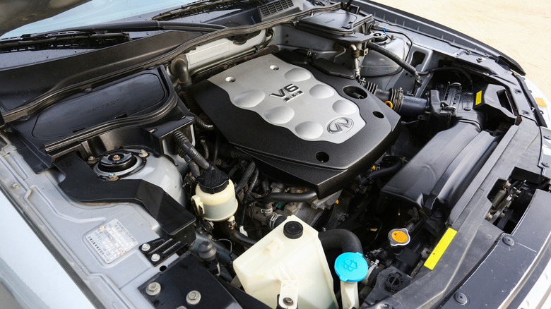 VQ engine under hood of vehicle