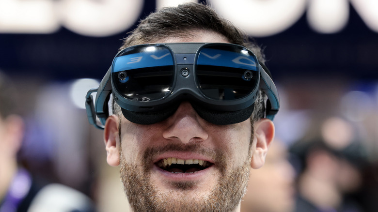 User laughing with HTC Vive XR Elite