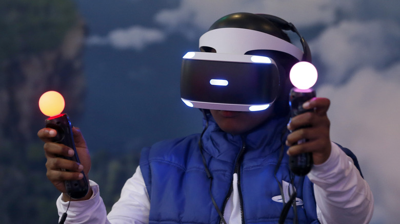 Man playing with PlayStation VR