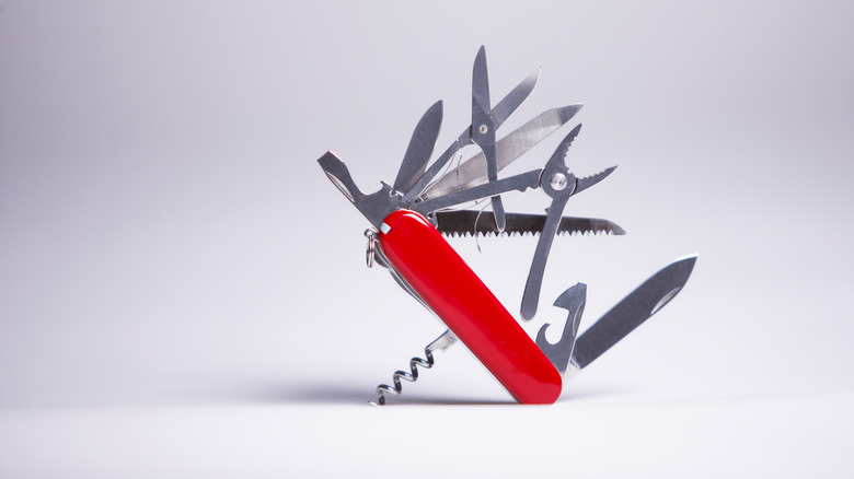 Red swiss army knife with multiple tools