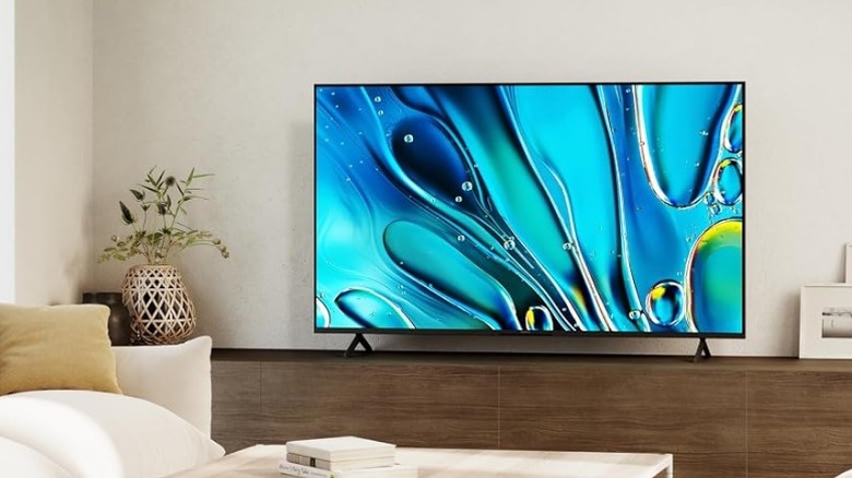 Sony Bravia 3 on entertainment stand in living room