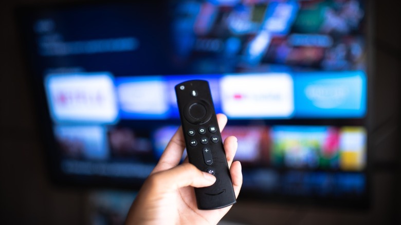 Person holding a Fire TV remote