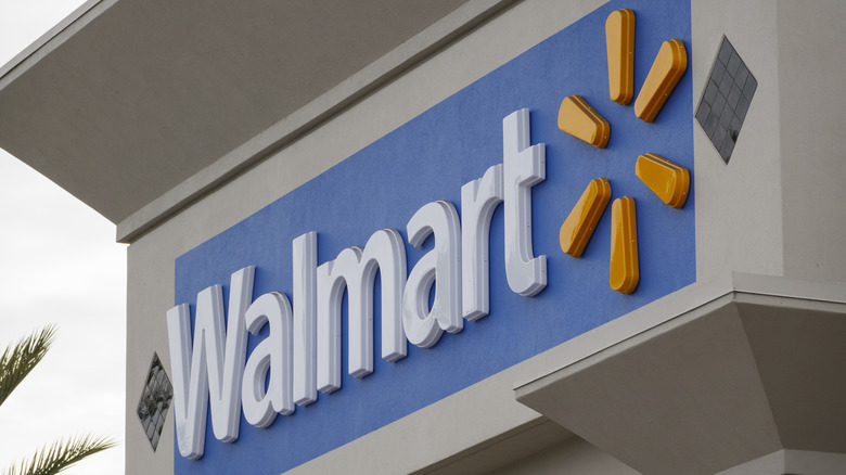 A Walmart logo is displayed outside one of their stores