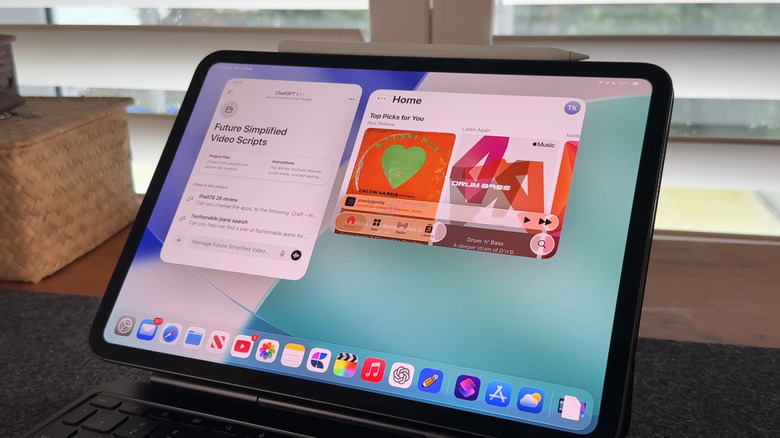 iPadOS 26 showing two apps opened with Dock visible