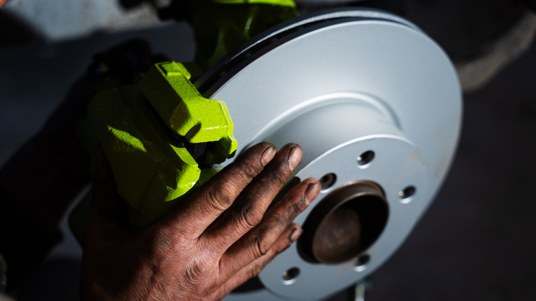 A close-up of a car's brand new brake rotor assembly.