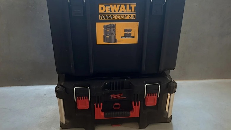 A DeWalt ToughSystem crate connected to a Milwaukee Packout case