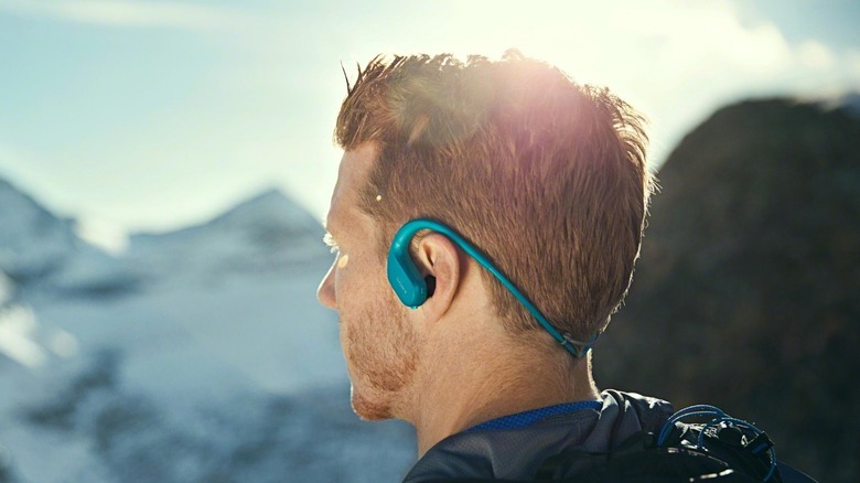 Hiker with Sony NW-WS413 headphones