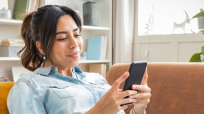 A woman using a phone