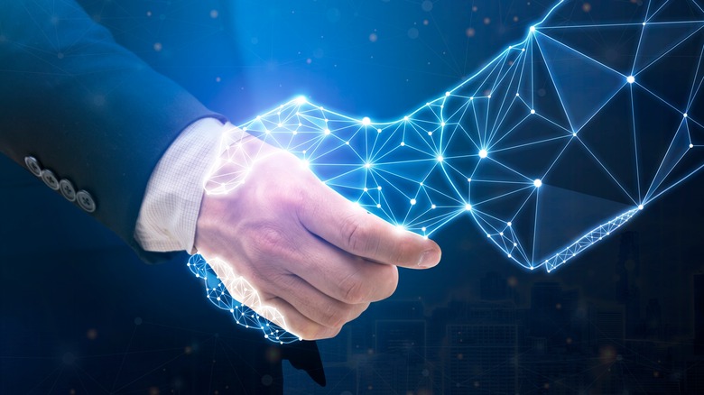 Human and AI handshake