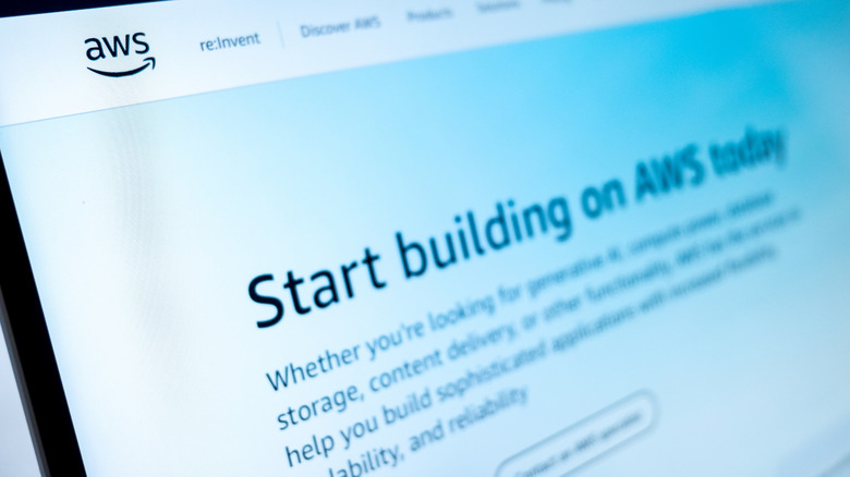 AWS website on a screen providing cloud computing solutions and digital services