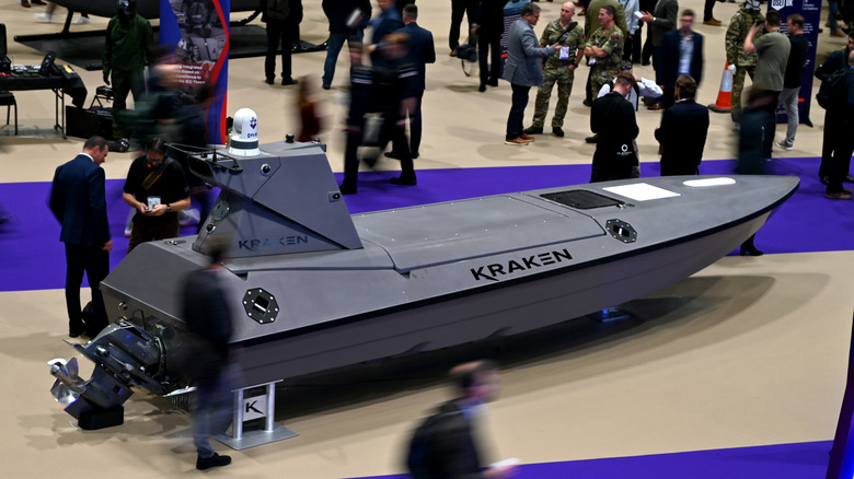 The K3 Scout displayed at a convention with a crowd walking around it