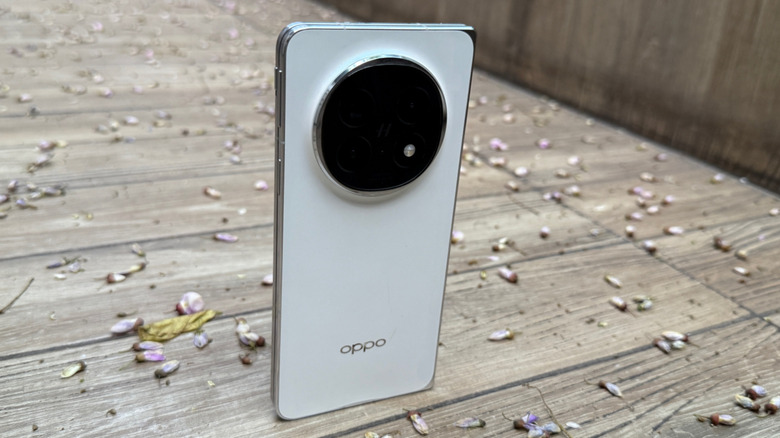 Oppo Find N5 standing on wooden floor.
