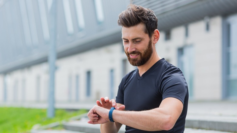 Man using smartwatch
