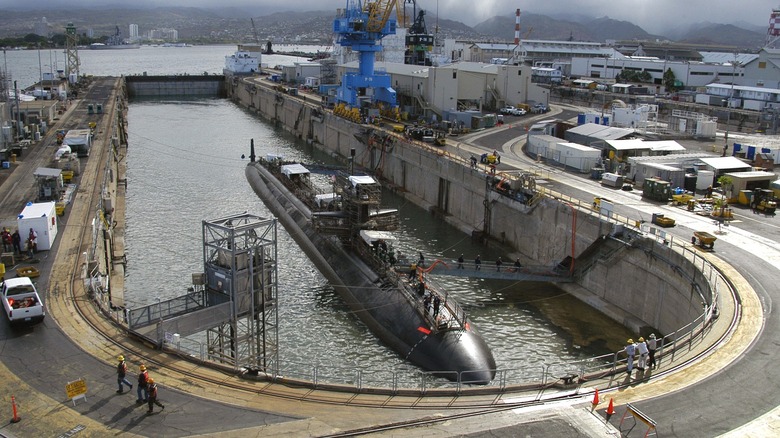 The USS Buffalo undocking from a dry dock at Pearl Harbor Naval Shipyard