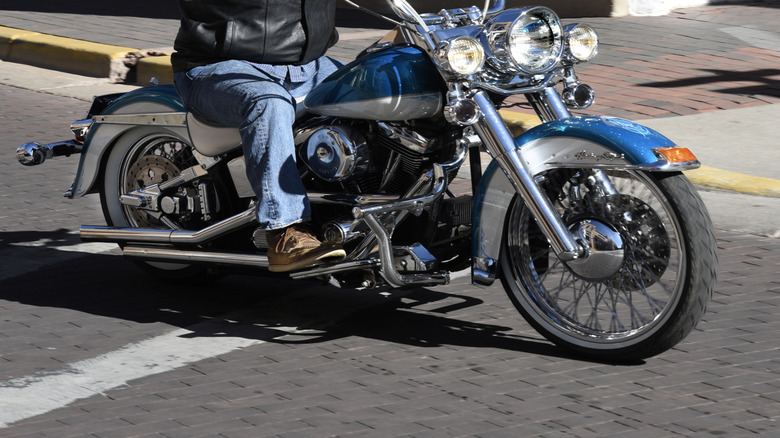 A motorcycle rider using ape hanger handlebars
