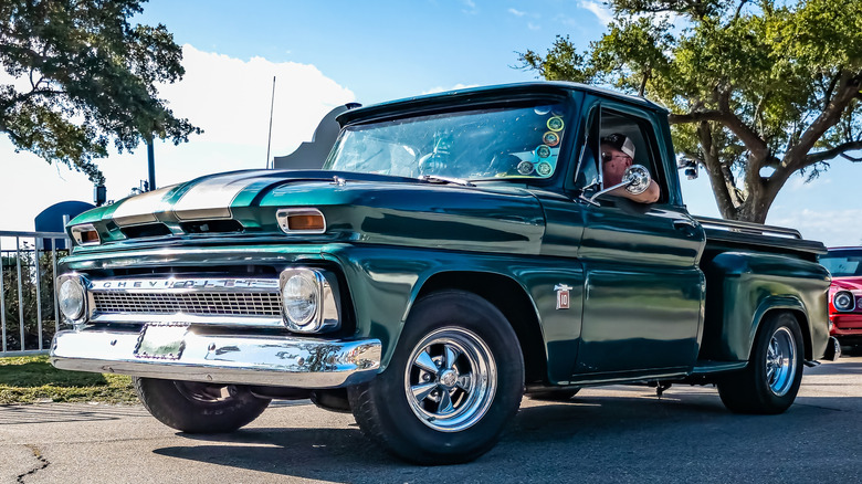 Green Chevrolet C10 pickup truck