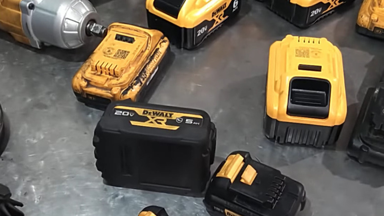DeWalt oil-resistant batteries on table