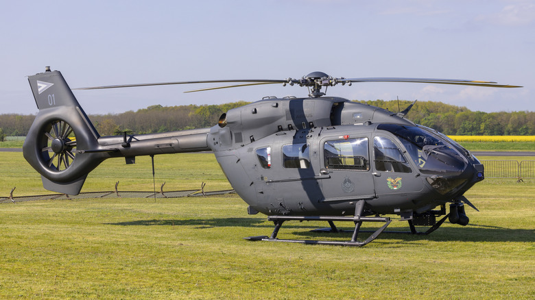 A UH-72B Lakota parked on grass.