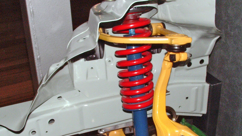 A double wishbone suspension, with some bushings in black