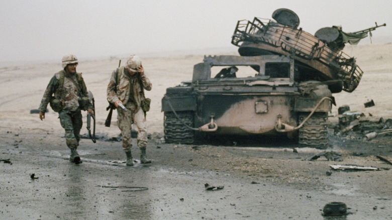 Military personnel on the Persian Gulf coast.