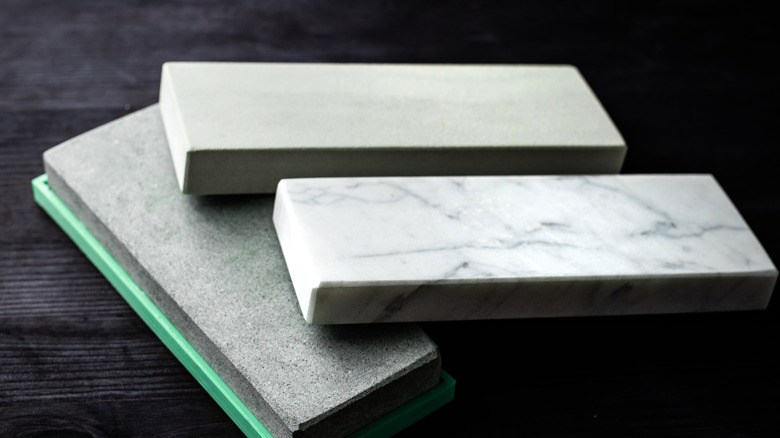 A set of whetstones on a table.