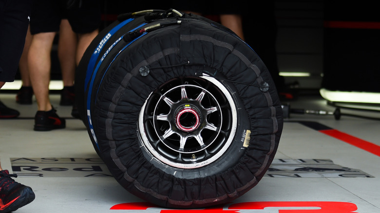 Set of Formula One tires with blankets on