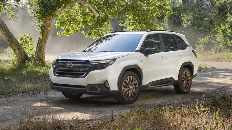 The new Subaru Forester on a gravel trail, front 3/4 view