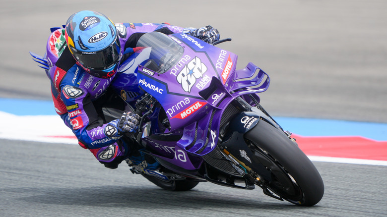 MotoGP rider on purple bike