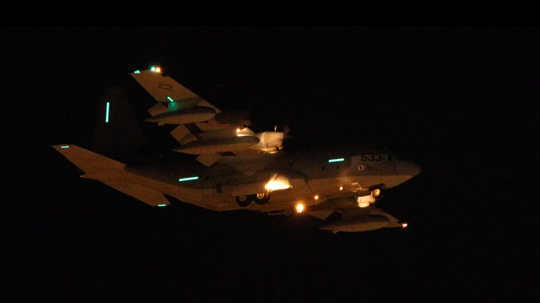 The formation lights on an Otis 51 at night, side view