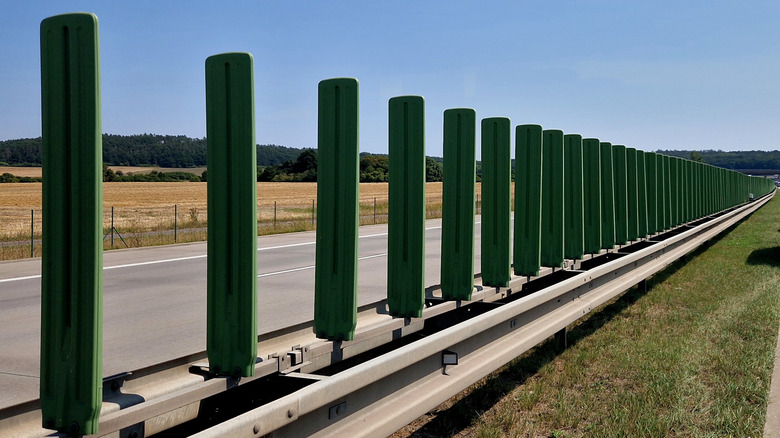 Green anti glare shields on a highway