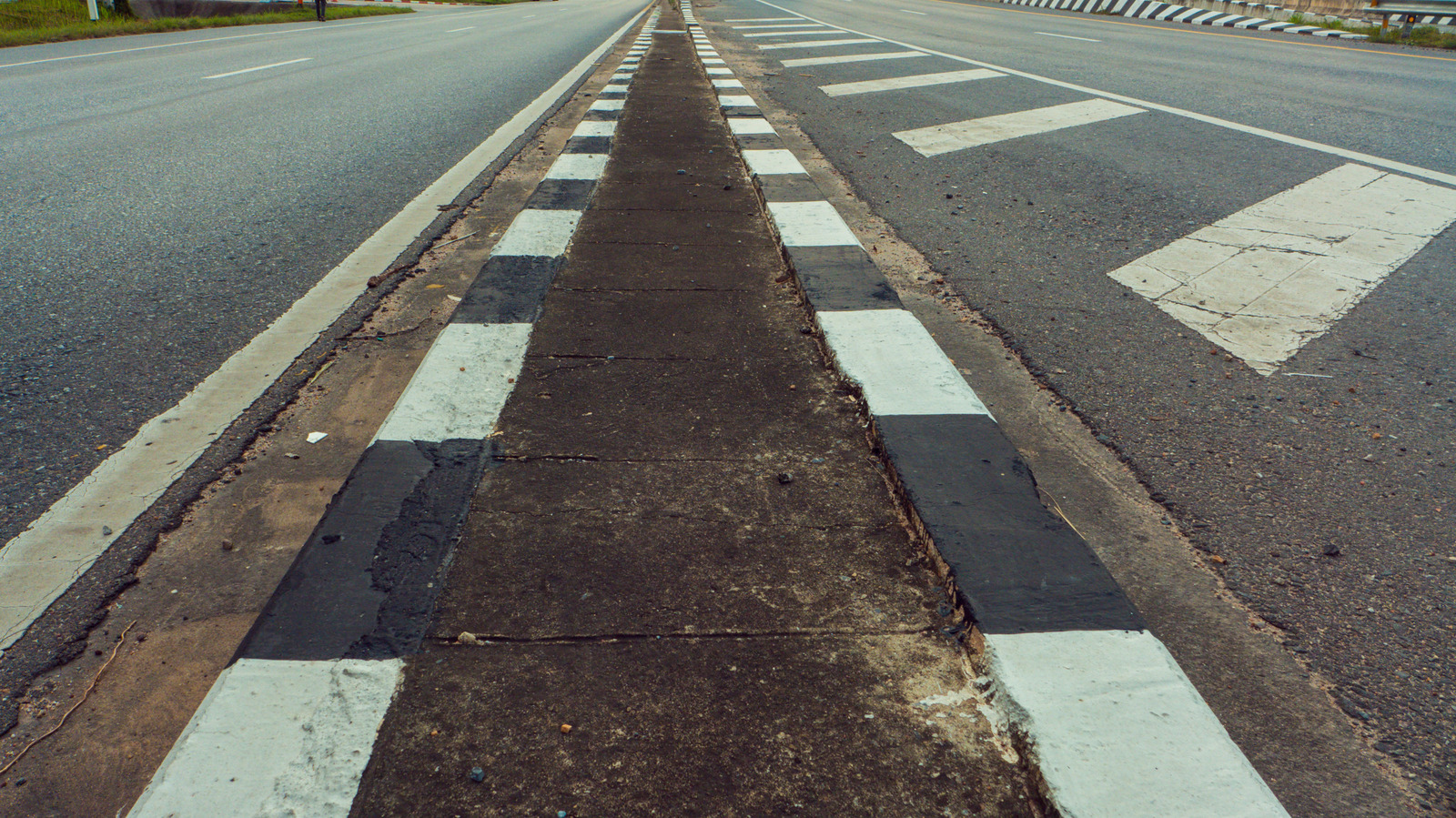 What Are The Half-Black And Half-White Stripes On The Highway For?