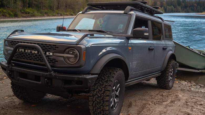 Ford Bronco towing a small boat