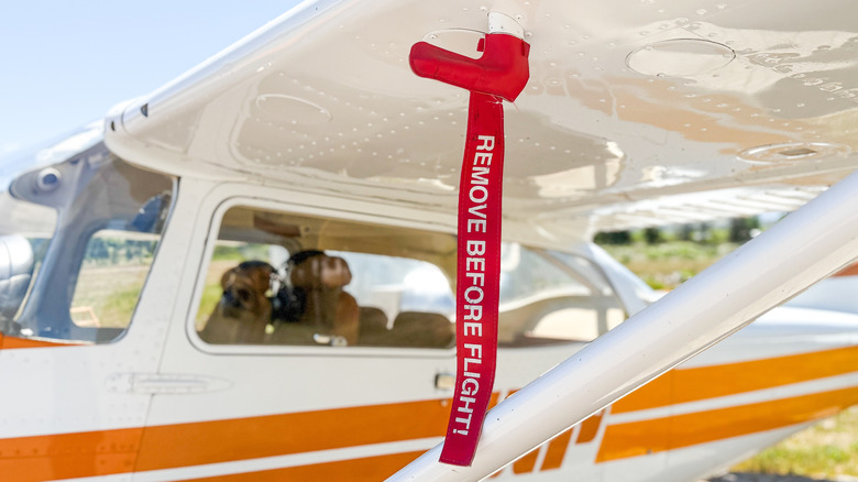 Remove before flight tag on aircraft wing