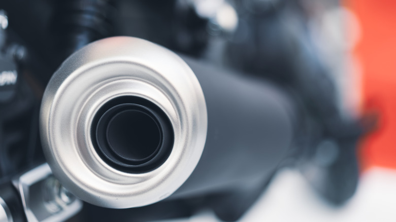 Close-up of motorcycle exhaust pipe.