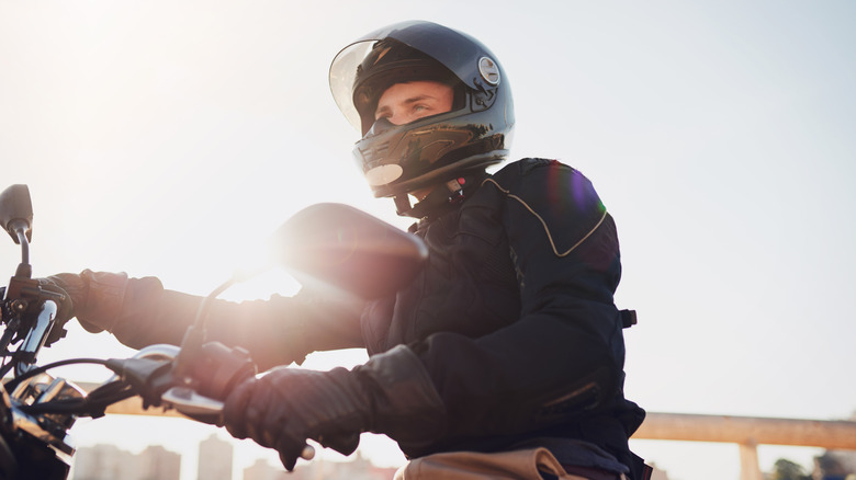 Motorcycle rider wearing full gear