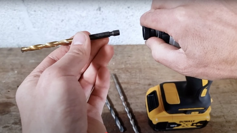 Close up of swapping a bit on an impact driver