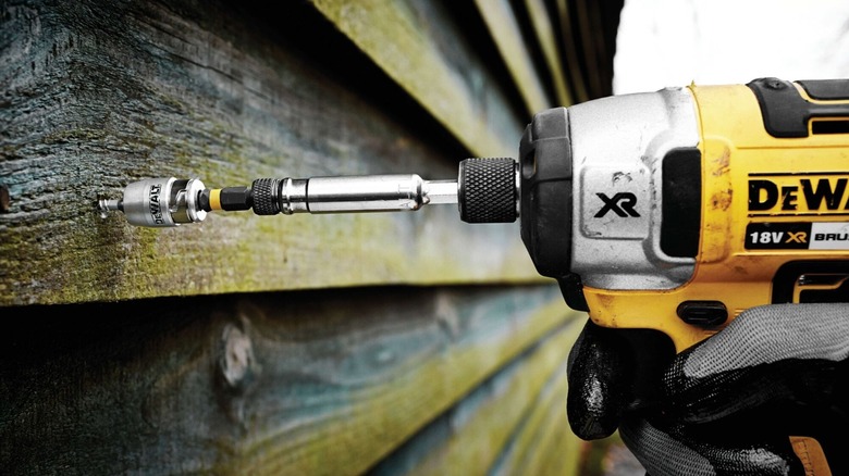 DeWalt impact driver in use