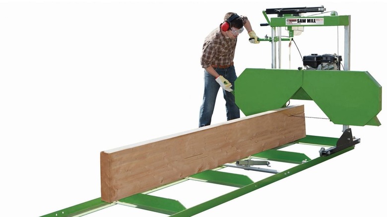 Central Machinery sawmill cutting wood