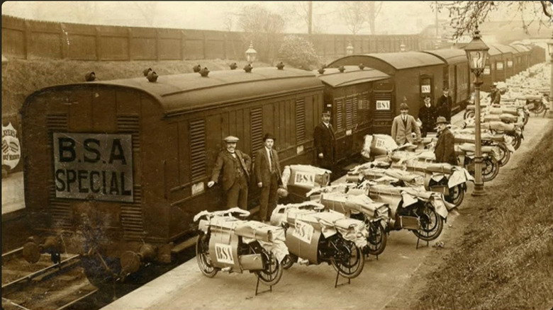 Old photo of BSA motorcycles waiting to be loaded onto a "BSA Special" train