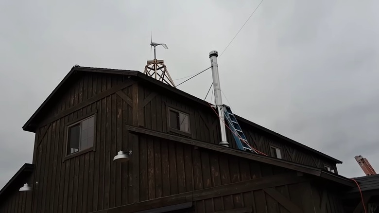 A 500 Watt wind turbine installed on the roof of a barn