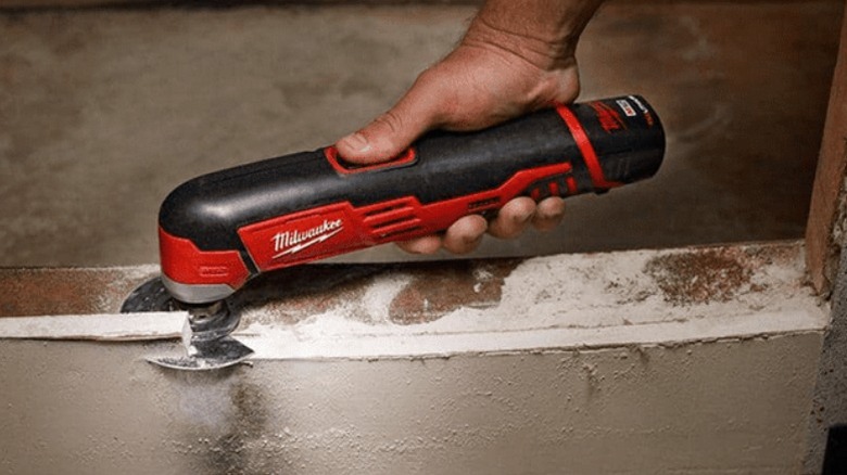Oscillating tool cutting drywall