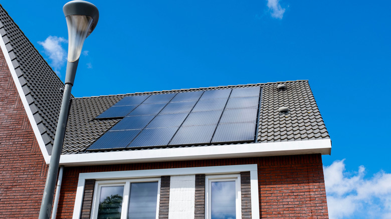 A house with solar panels fitted on roof