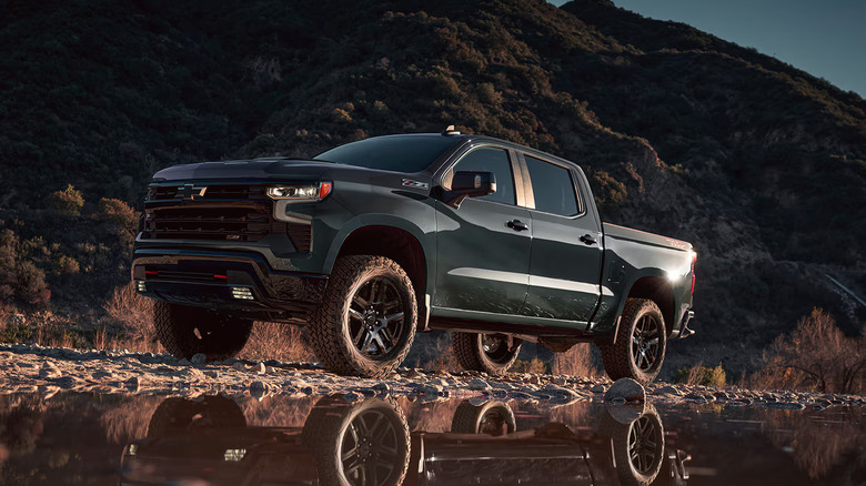 202 Chevrolet Silverado 1500 parked near a lake