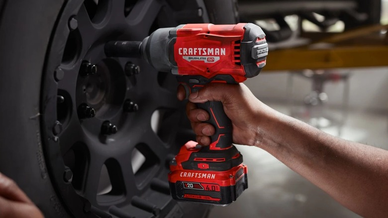 Craftsman V20 impact wrench in use on a tire