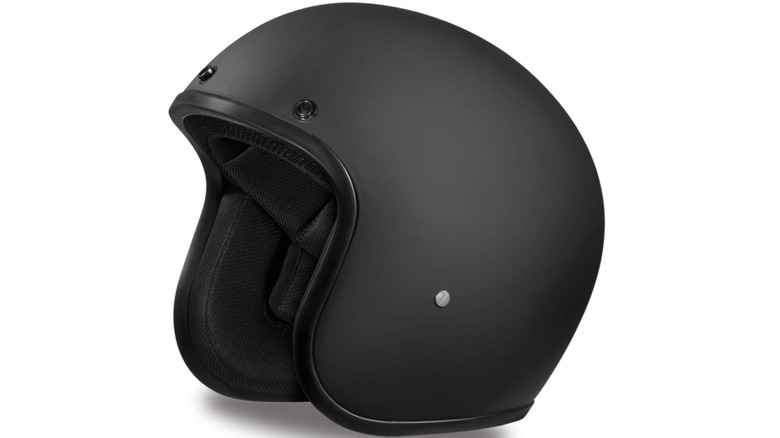 A black retro Xtreme Helmets motorcycle helmet against white background
