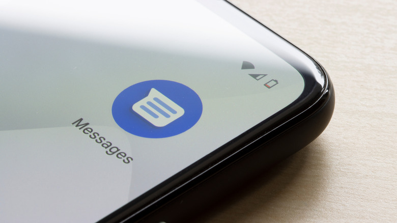Closeup of the Google Messages app icon seen on a smartphone