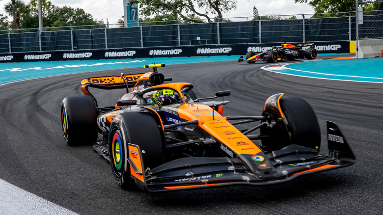 Formula 1 cars racing on track