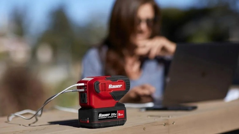 Bauer Power Source on a table with a person using a laptop in the background